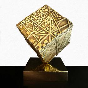 Angelo Rinaldi, Mark, scultura cubica in bronzo dorato con elementi in rilievo,cubo rotante su base, cubo h.cm.21x21, anno 1999