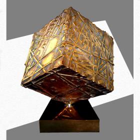 Angelo Rinaldi, Mark, scultura cubica in bronzo dorato con elementi in rilievo,cubo rotante su base, cubo h.cm.21x21, anno 1999