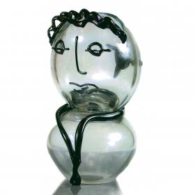 Angelo Rinaldi, Brutta e pestata, scultura in vetro massello irregolare, con sovrapposizioni di vetro nero, iridazione su tutta la superficie  
