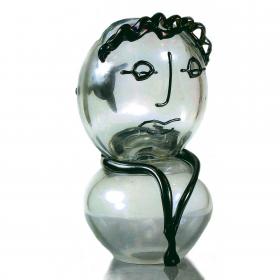 Angelo Rinaldi, Brutta e pestata, scultura in vetro massello irregolare, con sovrapposizioni di vetro nero, iridazione su tutta la superficie  