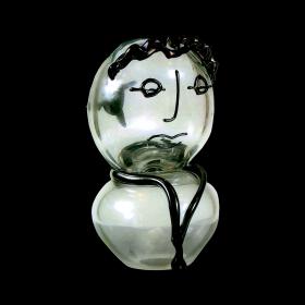 Angelo Rinaldi, Brutta e pestata, scultura in vetro massello irregolare, con sovrapposizioni di vetro nero, iridazione su tutta la superficie  